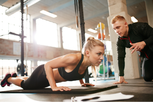 corrective exercise specialist working with athlete